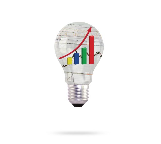 light bulb with financial charts